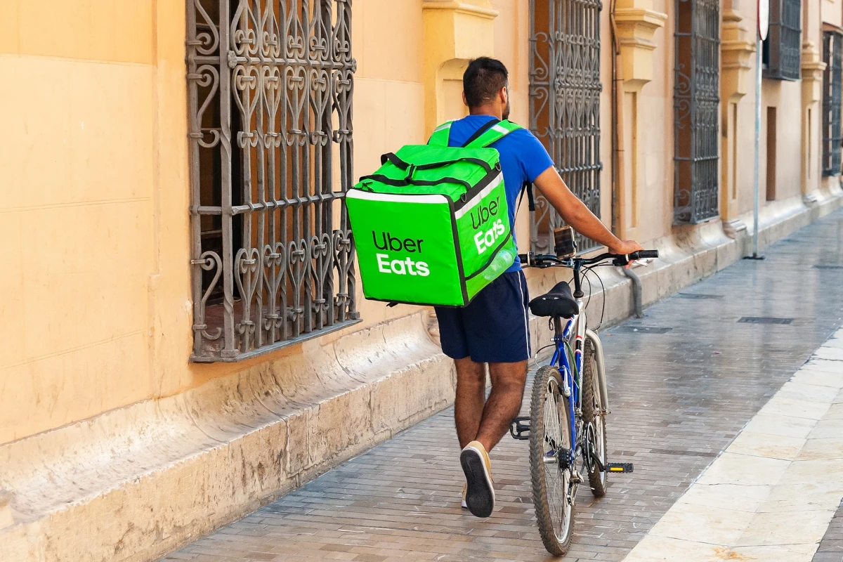 Uber Eats bicycle delivery person.